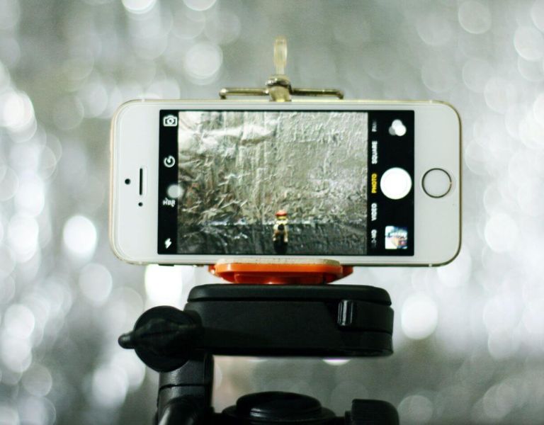 An iPhone sitting on tripod photography nature